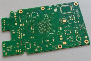 Bare printed circuit board showing copper pads, holes and outline represented in manufacturing data